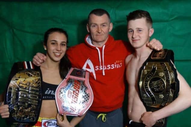 Iman Barlow, with dad Mark and younger brother Thai