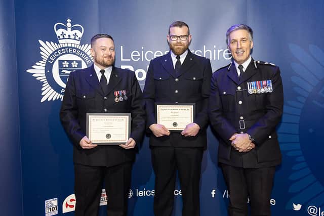 PCs David Tweddle and Edward McKinnon receive their bravery awards from former Chief Constable Rob Dixon