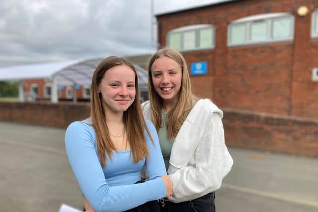 Izzy Hand and Orla Nelmes pictured today Long Field Spencer Academy on GCSE results day