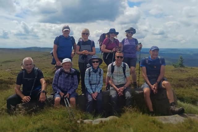 Some of the members of Melton Mowbray Ramblers take a break on a recent walk