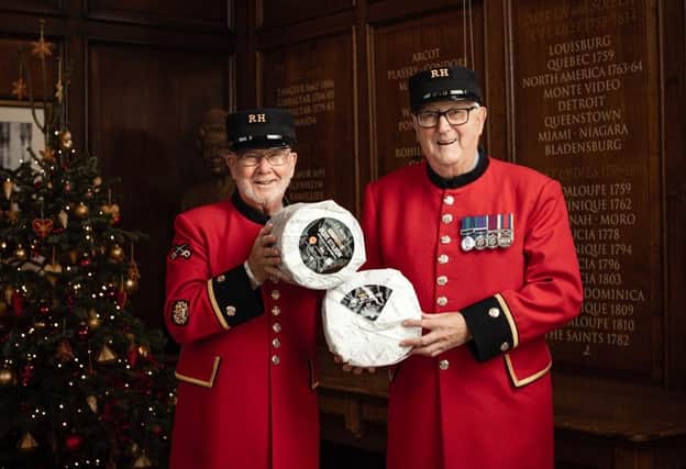 Chelsea Pensioners Roy Palmer and Ted Fell with donations from Colston Bassett, Cropwell Bishop and Long Clawson given to the Royal Hospital Chelsea