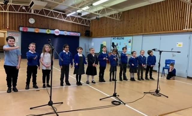 Pupils at The Grove Primary School, in Melton, record their Christmas CD
