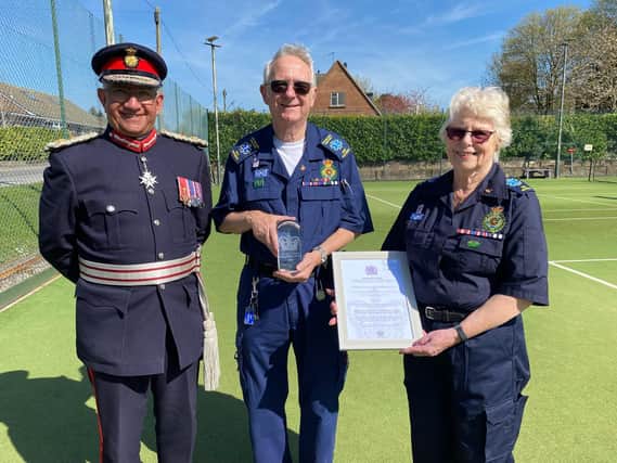 Founder members Peter and Ina Scott receive the King's Award for Voluntary Service from Lord Lieutenant of Leicestershire, Mike Kapur