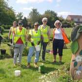 Volunteer members of the Friends of Melton Country Park at work - residents are being invited to help out with a clean up of the park for National Volunteer Week