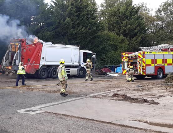 Firefighters tackle the fire in a Melton bin lorry, which was caused by household batteries being left in a bin