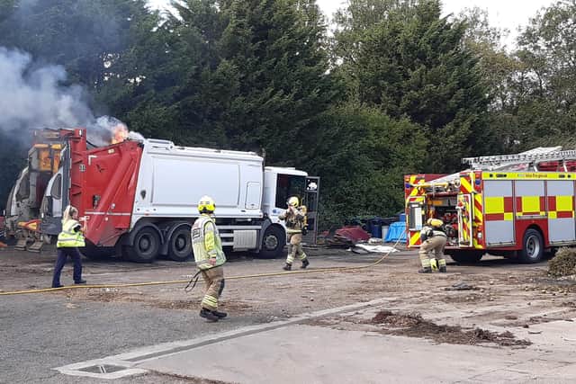 Firefighters tackle the fire in a Melton bin lorry, which was caused by household batteries being left in a bin