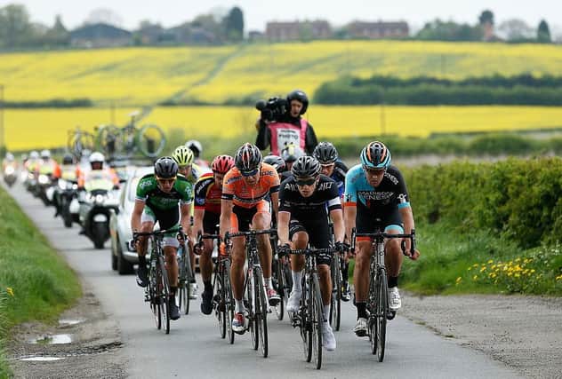 Eventual race winner Tom Moses of Rapha Condor JLT (C) leads the breakaway group during the 2014 edition of the CiCLE Classic from Oakham to Melton Mowbray (Photo by Harry Engels - Velo/Getty Images)