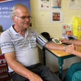 Nurse Heather Dawes carries out a blood pressure check today at Melton market