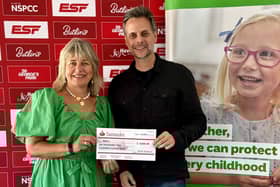 Martyn Young, director at ESF Events, presents a cheque for more than £6,000 to Barbara Elsey, the NSPCC’s Community Fundraising Manager for the East Midlands, from this year's fundraising effort for the charity