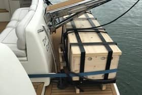 A coffin used at burials at sea