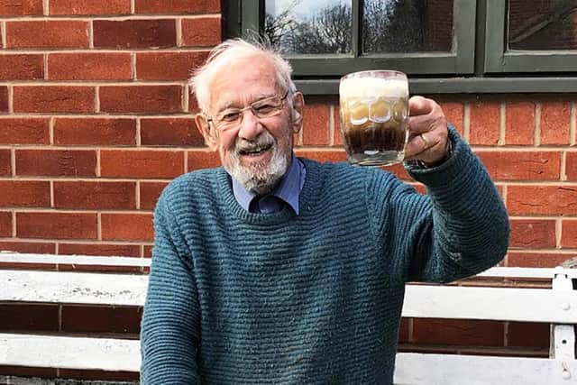 Peter Dalton enjoying a pint of ale