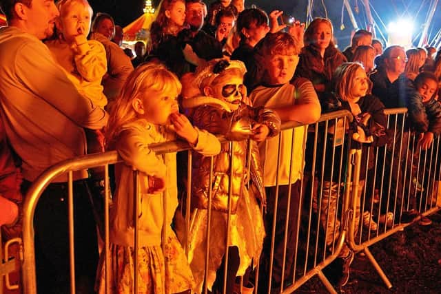 Crowds enjoy the glow of the bonfire in the Play Close on Saturday night
Whitehouse Photography
