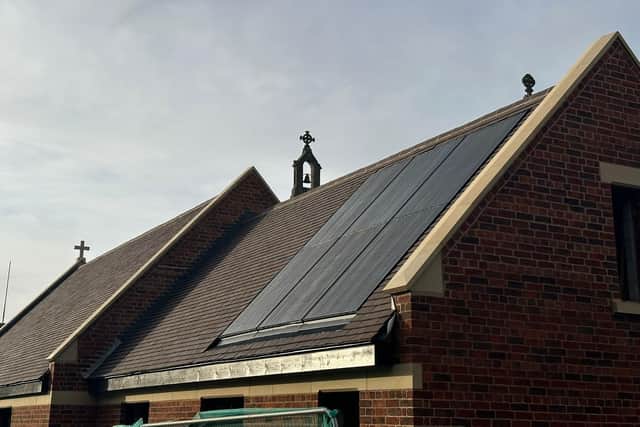 The solar panels on the roof of the new community hall