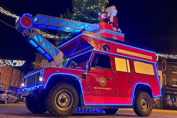 Santa rides the Trumpton fire engine during this year's Melton fundraising effort by local firefighters