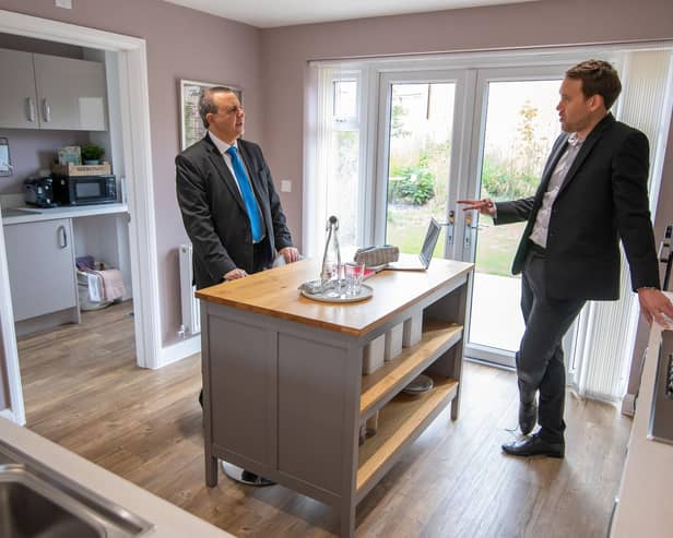 Alberto Costa MP on a tour of the show home with DWH Sales Manager, Charlie Wemyss