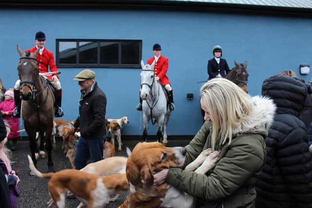 Riders and hounds from the Quorn Hunt at Melton Mowbray Livestock Market on New Year's Day