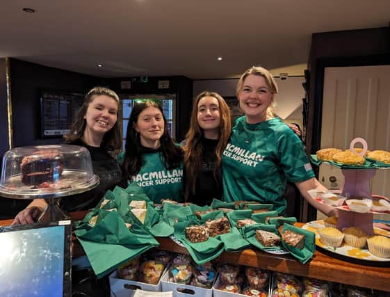 Bryony Mundin (right) with some of her team at The Regal who are raising funds for Macmillan Cancer Support
