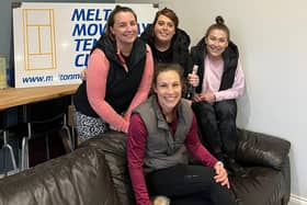 Some of Melton's successful squad celebrate their win.