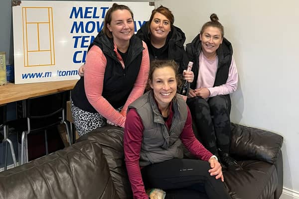 Some of Melton's successful squad celebrate their win.