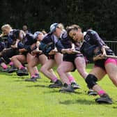 Melton Tug of War team pulling hard during a competition