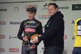 Harry Hudson receives a commemorative Melton Mowbray Pork Pie from Richard Griffiths, general manager of Ye Olde Pork Pie Shoppe, after winning last year's Junior CiCLE Classic