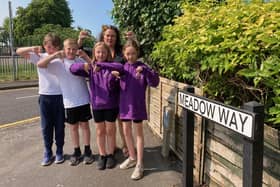 Sherard Primary School headteacher Helena Blumfield with pupils Thomas, Bea, Orla and Joe at one of the locations where parents have been parking dangerously
