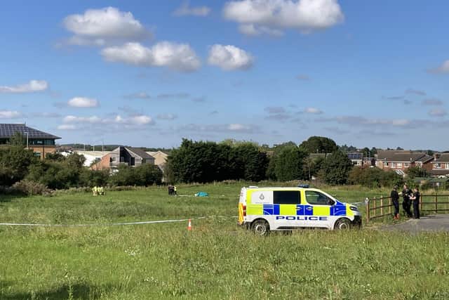 The wreckage of the glider in a field near the new Bellway estate in Melton this afternoon