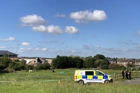 The wreckage of the glider in a field near the new Bellway estate in Melton this afternoon