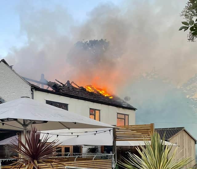 Flames in the roof of the Tap and Run pub at Upper Broughton this morning

PHOTO NOTTS FIRE AND RESCUE SERVICE