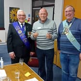 Bob White, of the Melton prostate cancer support group, receives a cheque from Peter Caldwell-Jones and Geoff Knox from the John Franklyn Selby lodge of the Leicestershire Province of the Royal Antediluvian Order of the Buffaloes