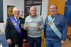 Bob White, of the Melton prostate cancer support group, receives a cheque from Peter Caldwell-Jones and Geoff Knox from the John Franklyn Selby lodge of the Leicestershire Province of the Royal Antediluvian Order of the Buffaloes