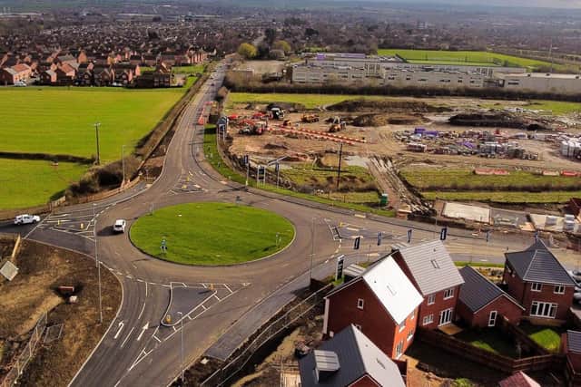 A drone image of the new roundabout on Scalford Road, Melton, with John Ferneley College at the top of the photo and the new Bloor Homes development to the right
PHOTO MICHAEL RILEY
