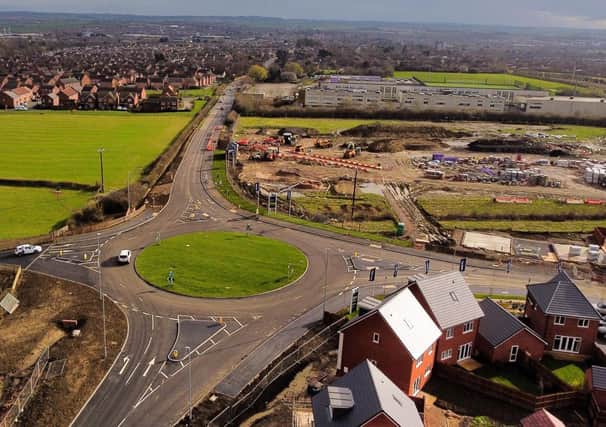 A drone image of the new roundabout on Scalford Road, Melton, with John Ferneley College at the top of the photo and the new Bloor Homes development to the right
PHOTO MICHAEL RILEY