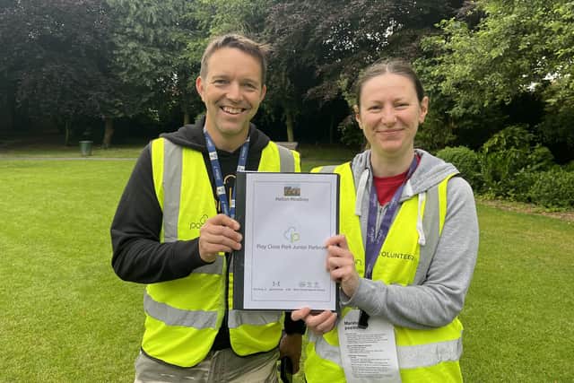 Organisers of Melton's junior parkrun with the new inclusive guide produced by Birch Wood Special School