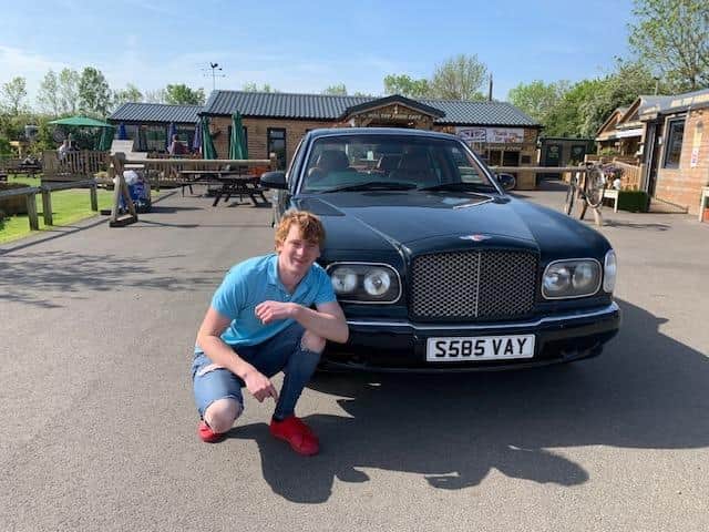 Cormac Boylan (22) with his Bentley car
