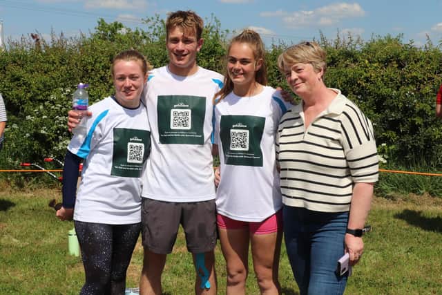 Victoria, William, Grace and Helen Sercombe after Will finished seven marathons in seven days last year at the Leicestershire YFC rally