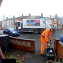 Video: Bin man misses Christmas treat - and dumps it in lorry