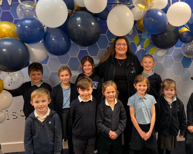 Headteacher Karen Lambert with some of her pupils at Stathern Primary School