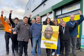 Staff and volunteers at The Hanger charity superstore in Melton Mowbray celebrate funding 1,000 lifesaving missions for the local air ambulance service