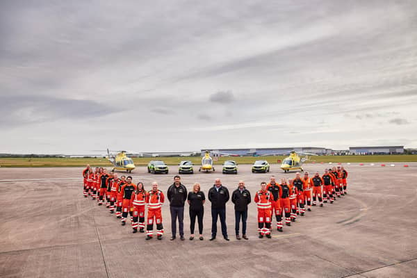 Crew members with the Derbyshire, Leicestershire & Rutland Air Ambulance (DLRAA)