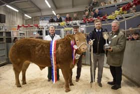 JB Thompson of Stainby are presented with The Brownlow Challenge Cup, for Champion Beast in the Fatstock Show, by the Mayor of Melton, Councillor Alan Hewson, Melton & Belvoir Agricultural Society chair, Hugh Brown, and auctioneer, Scott Ruck