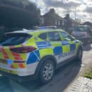 Police at the scene of Tuesday's collision in Scalford Road in which two schoolgirls were injured
PHOTO GEROGE ICKE