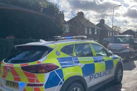 Police at the scene of Tuesday's collision in Scalford Road in which two schoolgirls were injured
PHOTO GEROGE ICKE