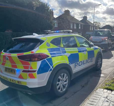 Police at the scene of Tuesday's collision in Scalford Road in which two schoolgirls were injured
PHOTO GEROGE ICKE