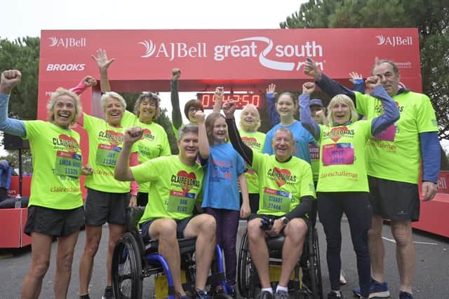 Dan Spincer and Stuart Hall pictured with their fellow fundraisers at the start line for the Great South Run