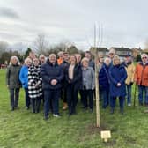 Friends of Melton Country Park members and borough councillors with one of the trees in memory of Bill and Jean Forbes