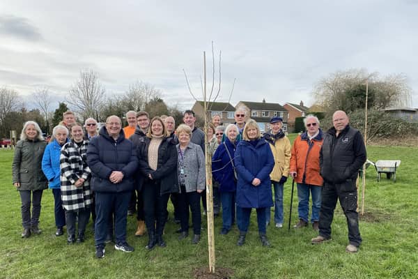 Friends of Melton Country Park members and borough councillors with one of the trees in memory of Bill and Jean Forbes