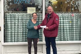 David Alcraft, Lodge Charity Steward for the Melton and Oakham Freemasons, presents a cheque to Jenny Hendry, Melton centre manager for Pepper's - A Safe Place