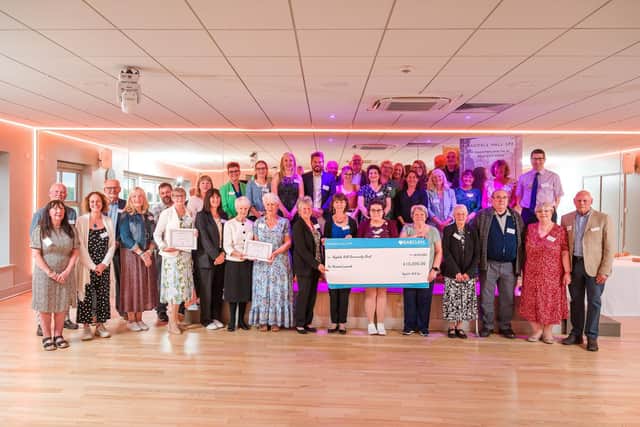 The beneficiaries with their cheques at last year's presentation evening for the Ragdale Hall Community Chest PHOTO Adam Shaw