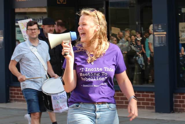 Anna Foster, one of the campaign's leaders, rallies support in the town centre